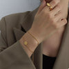 Double layered gold bracelet, 18K gold-plated titanium steel - Calypso Blue