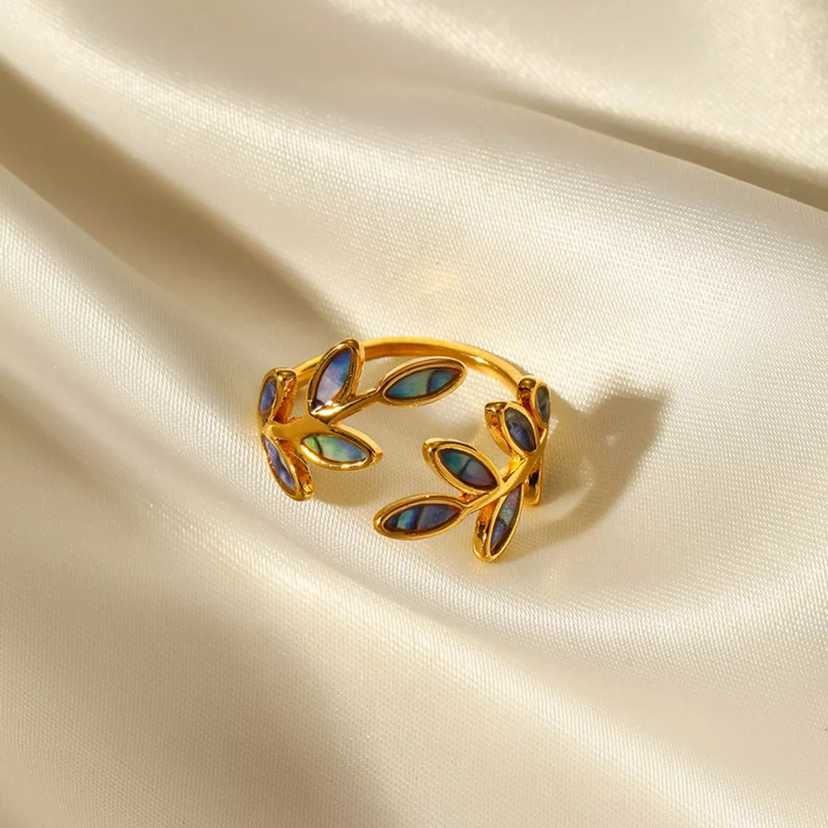 Gold leaf bypass ring with resin leaf - Calypso Blue