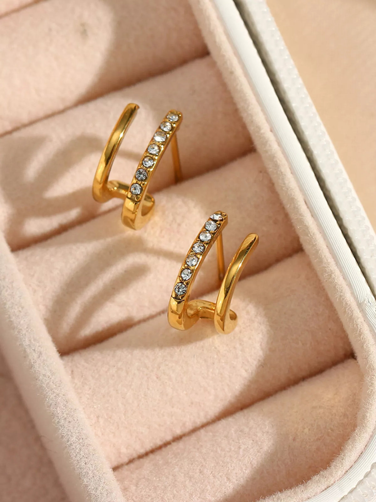 Double layer gold hoop earrings worn - view 2