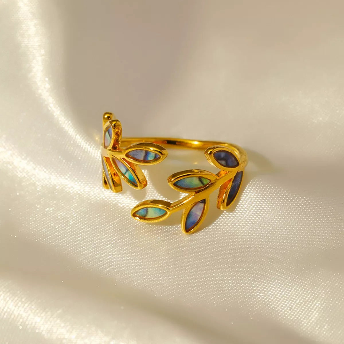 Gold leaf bypass ring worn on finger - view 2