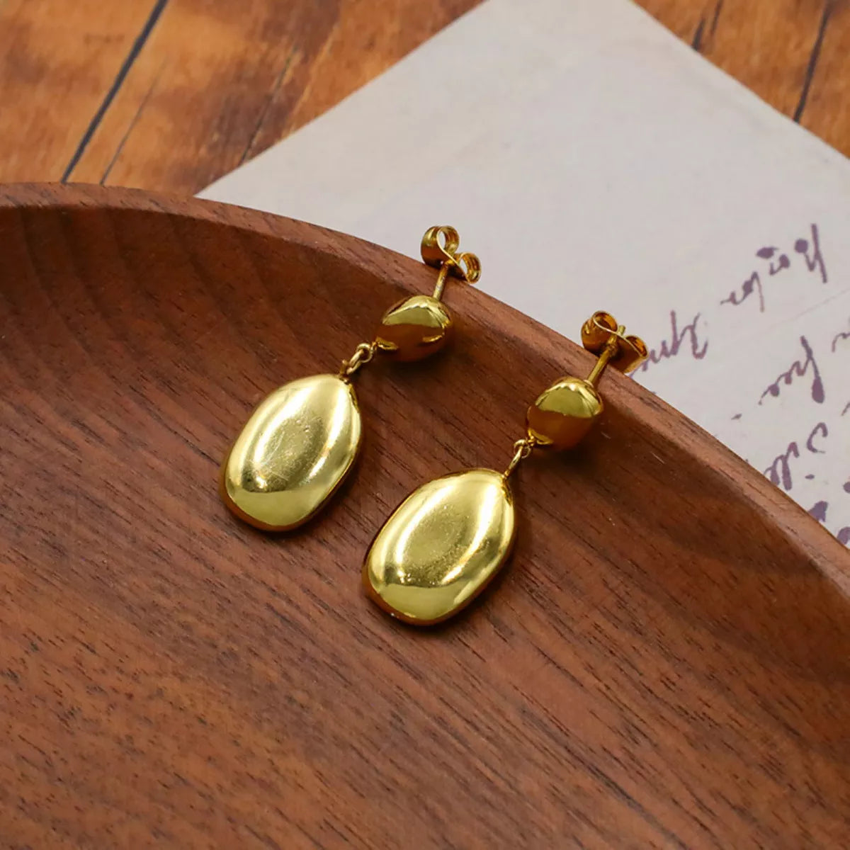 Gold drop earrings detail - view 3