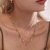 Gold heart charm necklace with zircon - Calypso Blue