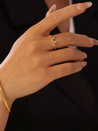Dainty bow ring worn on finger - view 2